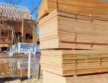 Stacked wooden building materials a stack of boards wood frame beam construction